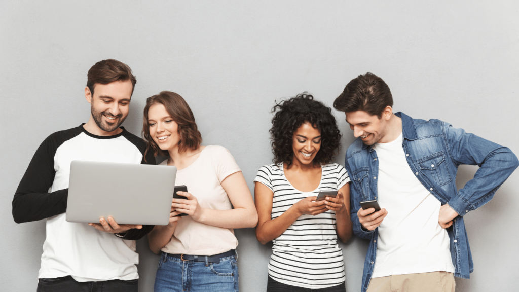 Young people using mobile phone happily to join virtual challenge